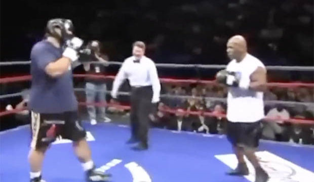 Even at 50 yrs old Mike Tyson has to hold opponent up after delivering right hand cannon