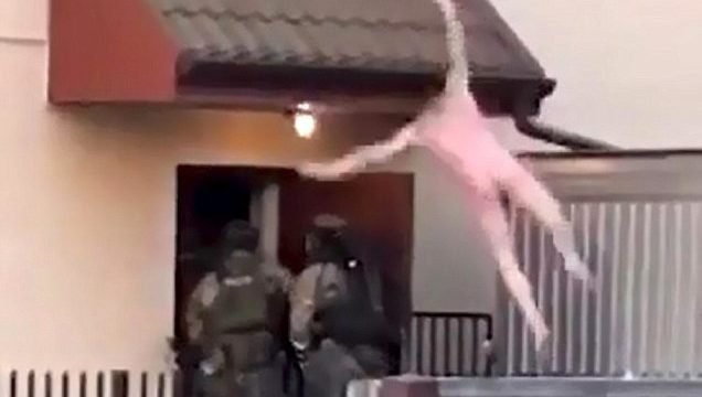 Naked criminal jumps out of window straight into the arms of a SWAT team