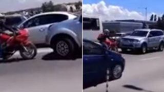 Biker brilliantly confronts SUV driver who tries to cut traffic