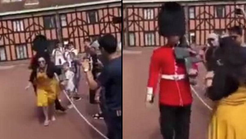 Queen’s guard shoves the sh*t out of sheila in his way