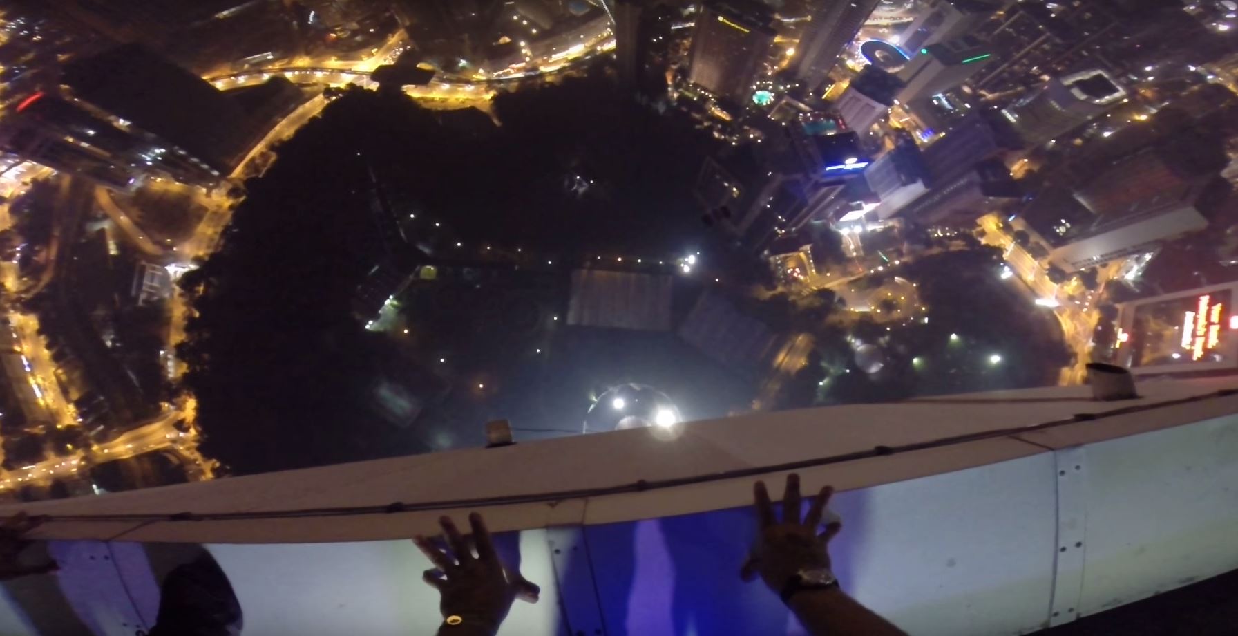 Base jumper makes f*cken epic entrance to rooftop pool party