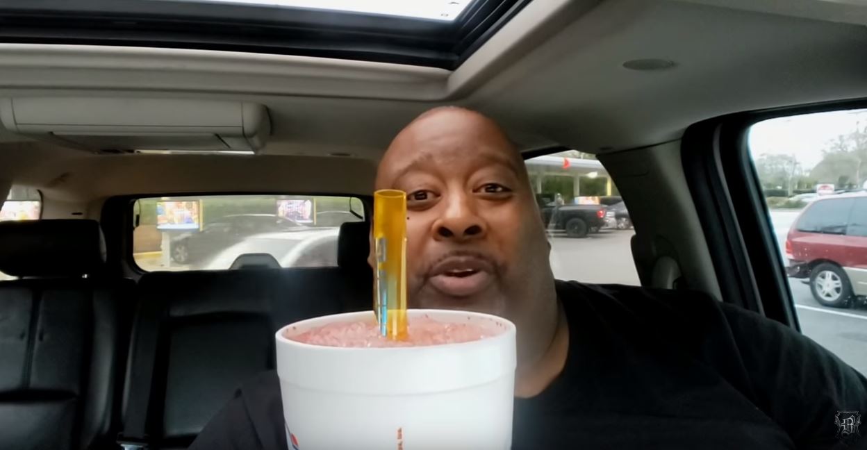 Big legend of a bloke downs huge icy cold sprite like it’s nothing