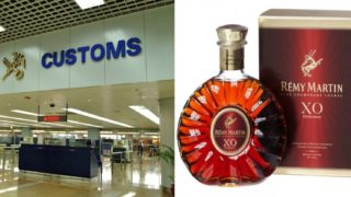 A sheila chugged an entire bottle of Cognac rather than hand it to airport security
