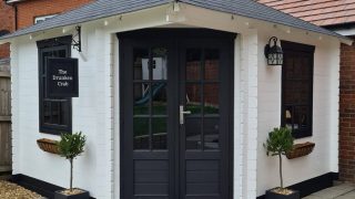 Couple builds a mini garden pub, stuns people with it’s handmade interior