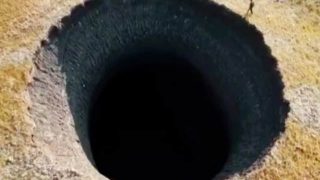 50m crater in Russia sparks bizarre theory