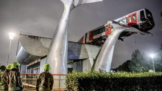 Dutch train crashes through barrier and lands on giant whale sculpture