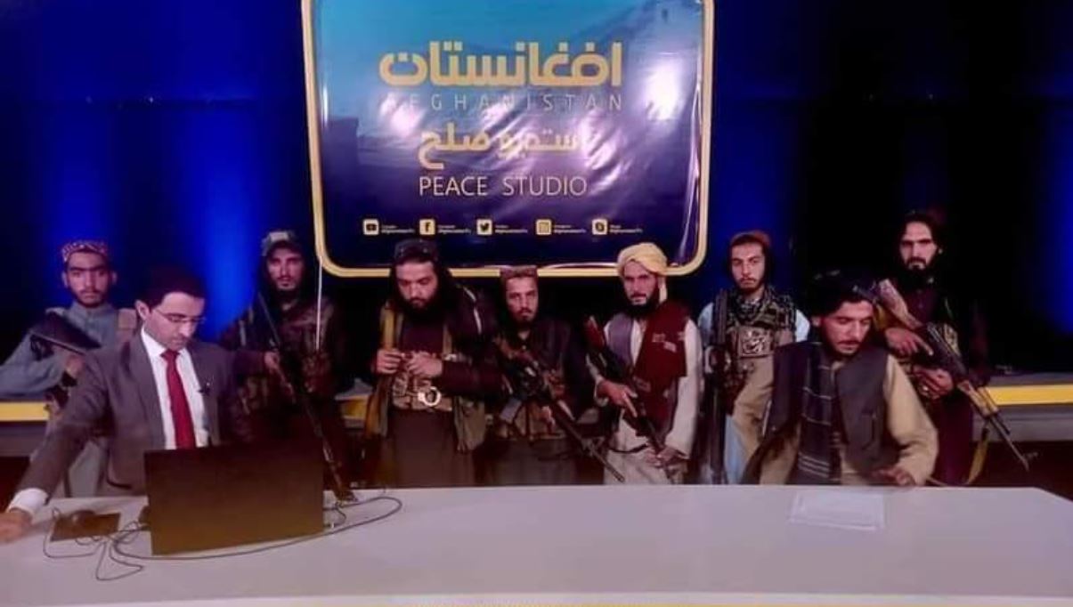 The moment a terrified TV presenter was held at gunpoint and asked to debate with Taliban soldiers