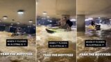 Bloke jet skis in flooded Brissie carpark