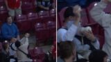 F**ken Super-dad at Reds game takes classic catch while feeding baby